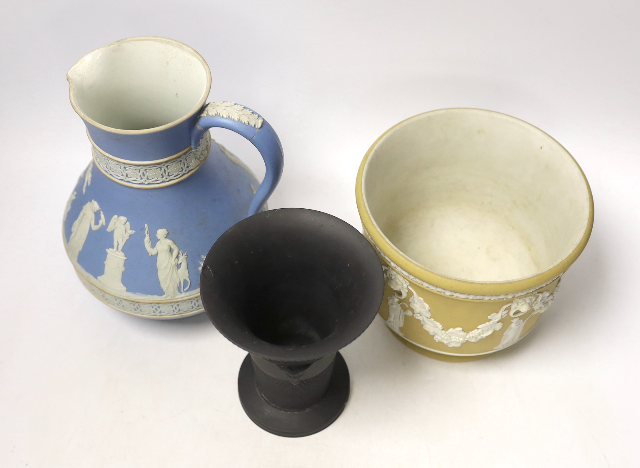 A Wedgwood jasper jardiniere and jug and a black basalt vase, tallest 21cm